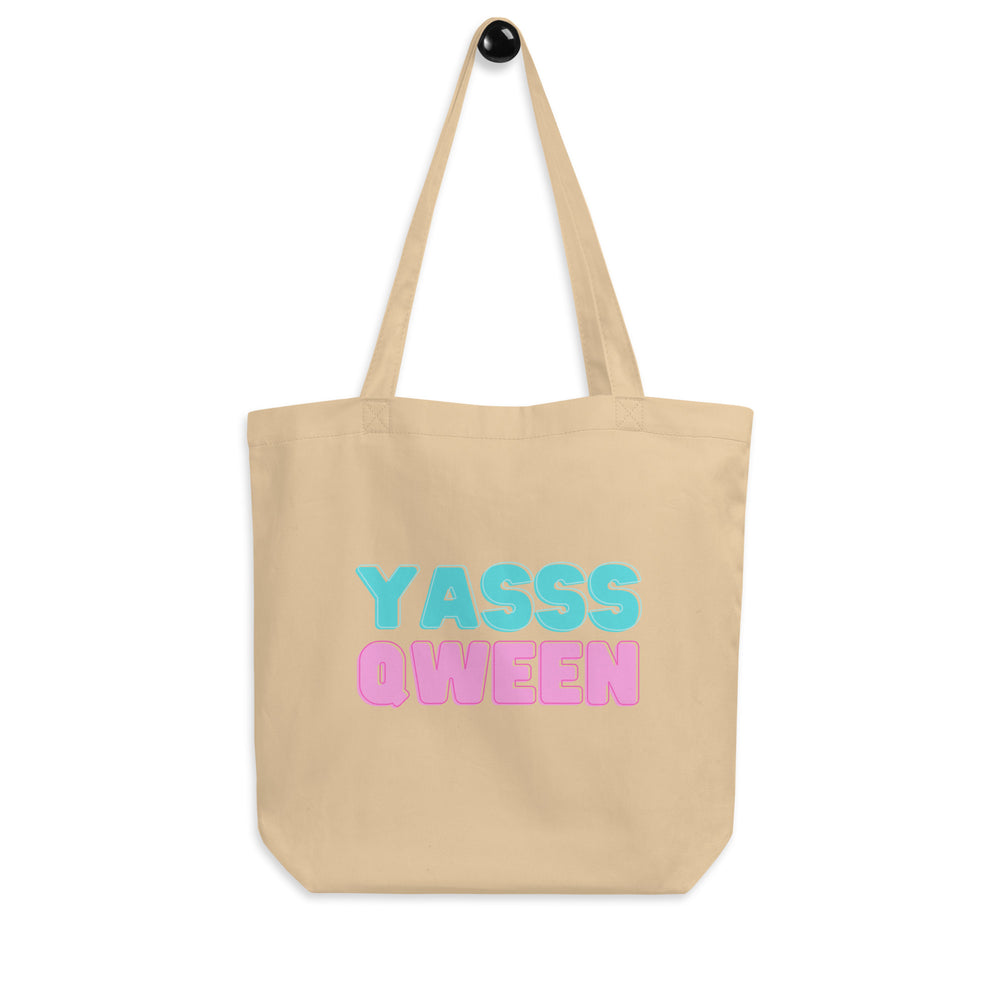Front view of an oyster canvas tote bag with colorful “YASSS QWEEN” lettering