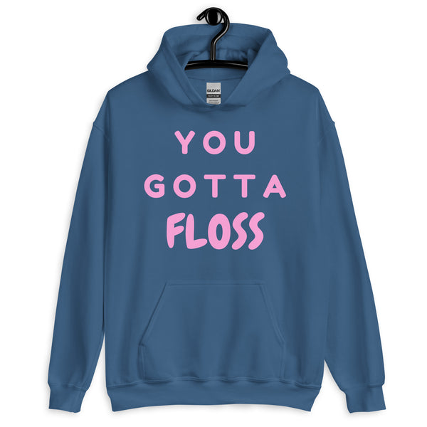 Front view of a blue pullover hoodie with pink “YOU GOTTA FLOSS” lettering