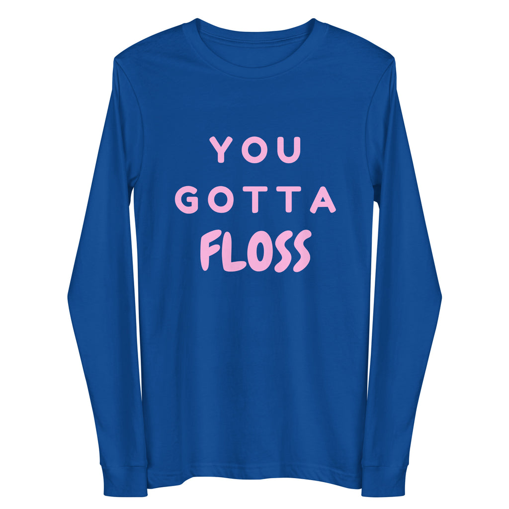 Royal-blue long-sleeve shirt with pink block lettering reading “YOU GOTTA FLOSS”