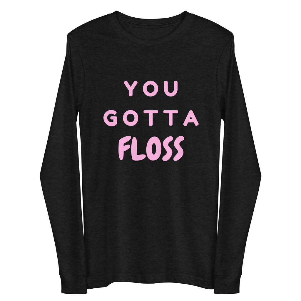 Front view of a black long-sleeve shirt with pink “YOU GOTTA FLOSS” lettering
