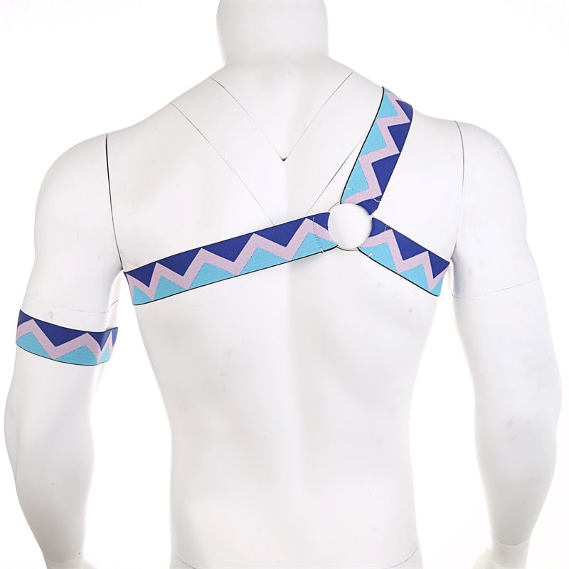 Rear view of a geometric zigzag elastic chest harness with central O-ring and matching arm band